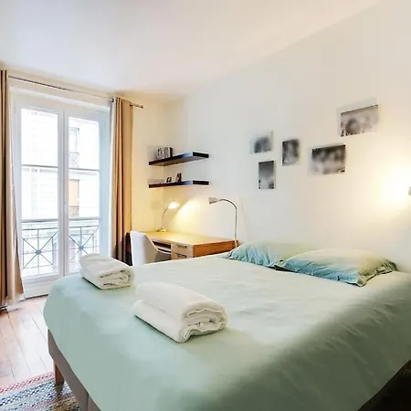 Апартаменты Exceptional Location Charme Parisien Париж